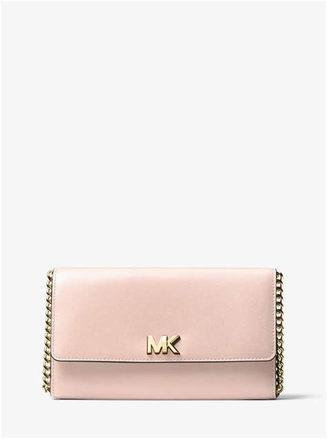 michael michael kors mott leather clutch|michael kors studded clutch.